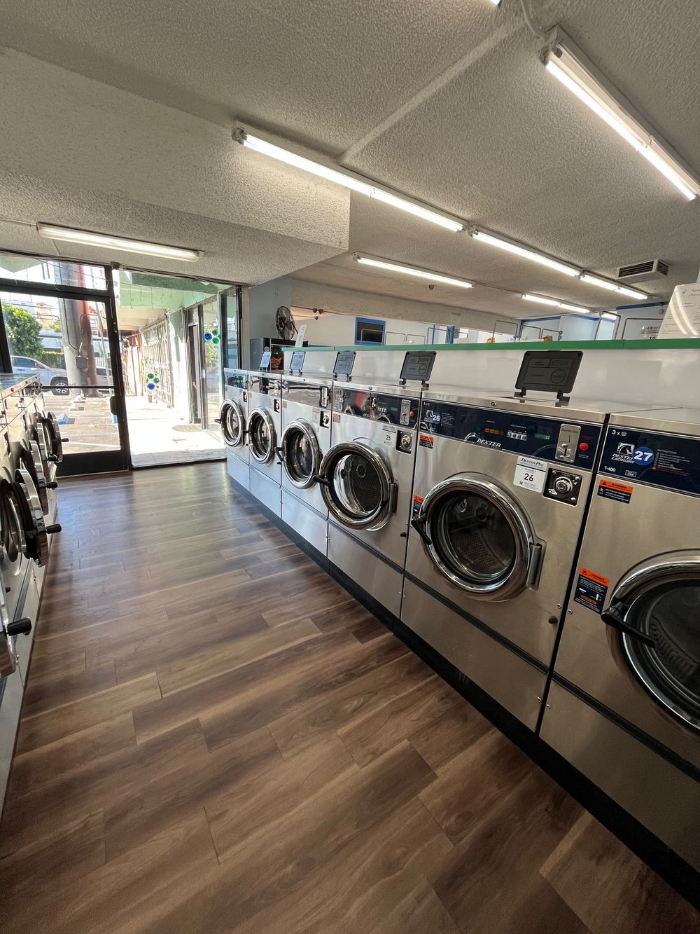 Front-load washers inside WonderWash Pico Blvd